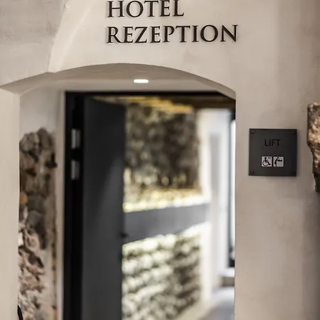 Отель Boutiquehotel Weisses Roessl 2*